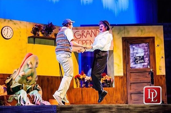 Seymour (Moore) and Mr. Mushnik (Manyet) dance during 