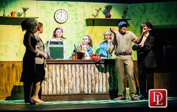 Seymour (Moore) and Mr. Mushnik (Manyet) dance during 