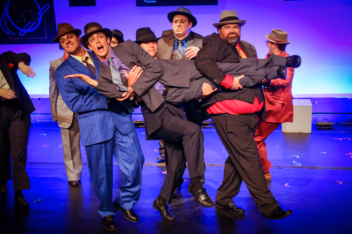 Sky Masterson (Aidan Panno) and Ensemble  Photo Credit: Fawn Nocera Photography  