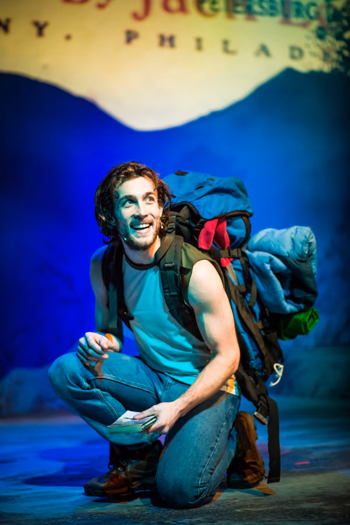 The Encore Musical Theatre Company opens the developmental premiere of INTO THE WILD on April 14th.
Based on the novel of the same name by Jon Krakauer, and ‘Back to the Wild’ by the Christopher J. McCandless Foundation, INTO THE WILD is written by Janet Allard (Book and Lyrics) and Niko Tsakalakos (Music and Lyrics). It is directed by Mia Walker, music directed by Tyler Driskill, with orchestrations by Brian Usifer, vocal arrangements by Angelique Mouyis, and stars Conor Ryan as Christopher McCandless.
All photos by Michele Anliker. The Encore Musical Theatre Company opens the developmental premiere of INTO THE WILD on April 14th.
Based on the novel of the same name by Jon Krakauer, and ‘Back to the Wild’ by the Christopher J. McCandless Foundation, INTO THE WILD is written by Janet Allard (Book and Lyrics) and Niko Tsakalakos (Music and Lyrics). It is directed by Mia Walker, music directed by Tyler Driskill, with orchestrations by Brian Usifer, vocal arrangements by Angelique Mouyis, and stars Conor Ryan as Christopher McCandless.
All photos by Michele Anliker.
