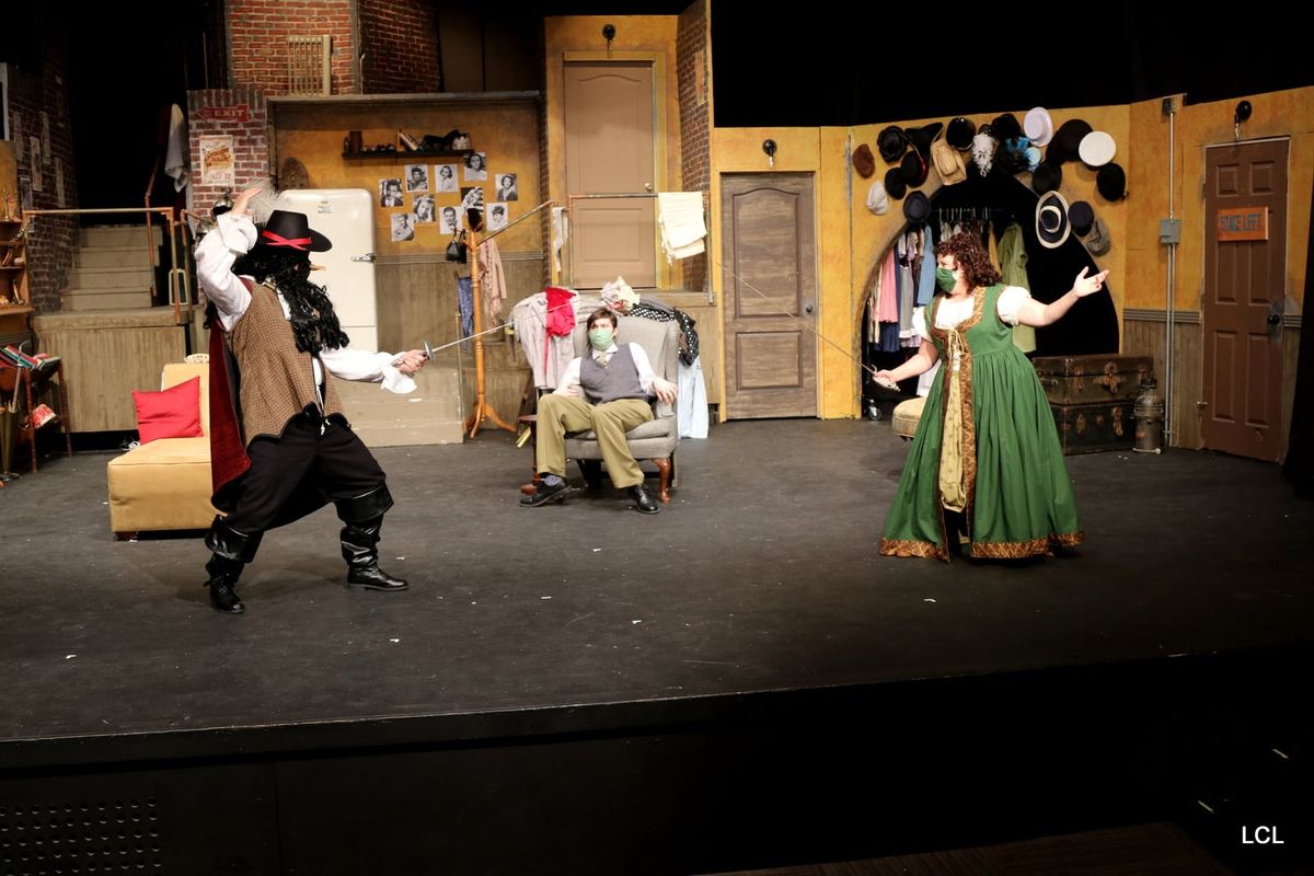 Charlotte (Liz Madden) and George Hay (Wayne White) are on tour in Buffalo in 1953 with a repertory consisting of Cyrano de Bergerac (the “revised, one nostril version”) and Noel Coward’s Private Lives, when they receive word that they might just have one last shot at stardom: Frank Capra is coming to town to see their matinee. Also pictured Kevin Downs
photo by Laura CiccarellileBlanc Charlotte (Liz Madden) and George Hay (Wayne White) are on tour in Buffalo in 1953 with a repertory consisting of Cyrano de Bergerac (the “revised, one nostril version”) and Noel Coward’s Private Lives, when they receive word that they might just have one last shot at stardom: Frank Capra is coming to town to see their matinee. Also pictured Kevin Downs
photo by Laura CiccarellileBlanc