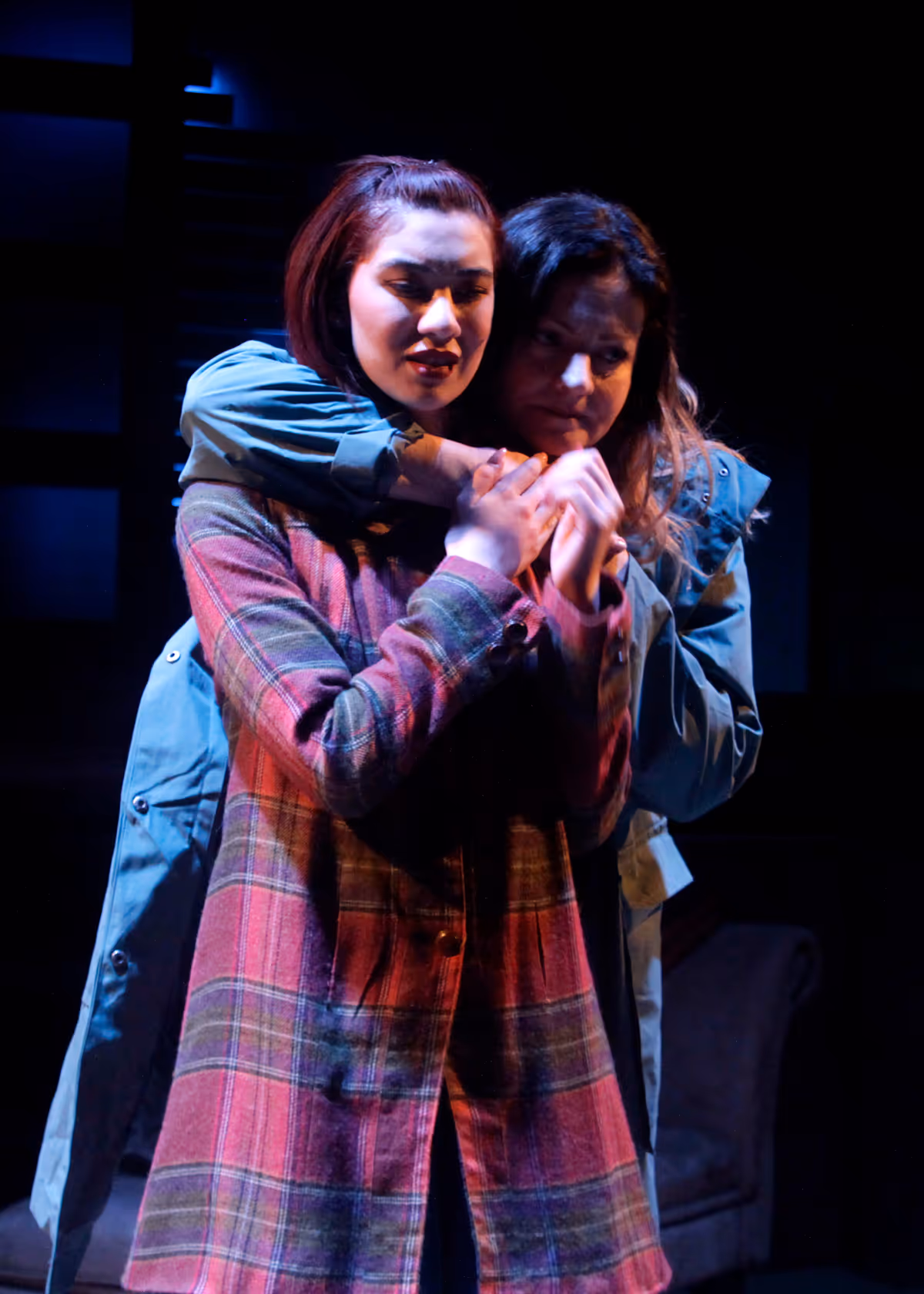 Angie Chavez and Jocelyn A. Brown in "Next to Normal," the Pulitzer Prize-winning musical by Tom Kitt and Brian Yorkey. Directed by Matthew McCray, with music direction by Stephen Hulsey, this brave and groundbreaking musical plays January 28 - February 27, 2022 at the Bette Aitken theater arts Center. Photo by Tanya Catiller. 