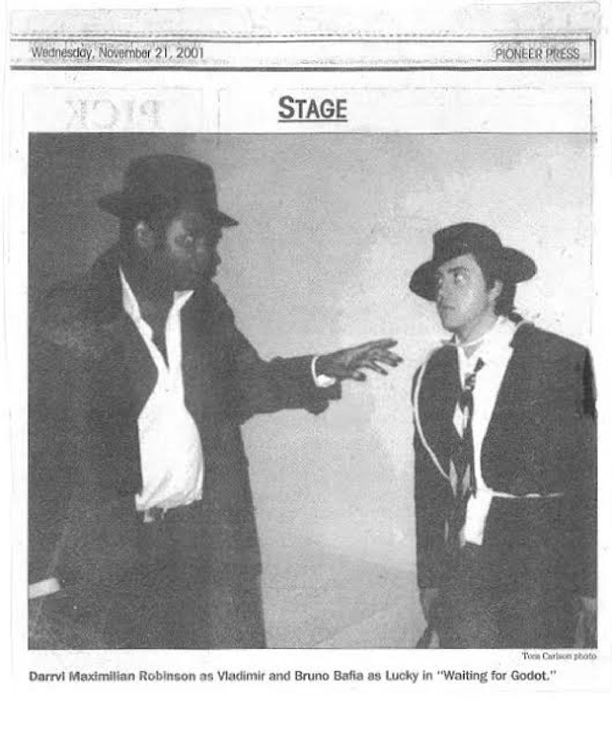 VLADIMIR PERUSES LUCKY!: 2001 Pioneer Press news photo of Director Darryl Maximilian Robinson as Vladimir and Bruno Bafia as Lucky in the 2001 Excaliber Shakespeare Company of Chicago revival of Samuel Beckett's "Waiting For Godot" presented at The Harrison Street Galleries Studio Theatre in Oak Park, Illinois. ESC Cast photo by Andy Carlson. VLADIMIR PERUSES LUCKY!: 2001 Pioneer Press news photo of Director Darryl Maximilian Robinson as Vladimir and Bruno Bafia as Lucky in the 2001 Excaliber Shakespeare Company of Chicago revival of Samuel Beckett's "Waiting For Godot" presented at The Harrison Street Galleries Studio Theatre in Oak Park, Illinois. ESC Cast photo by Andy Carlson.
