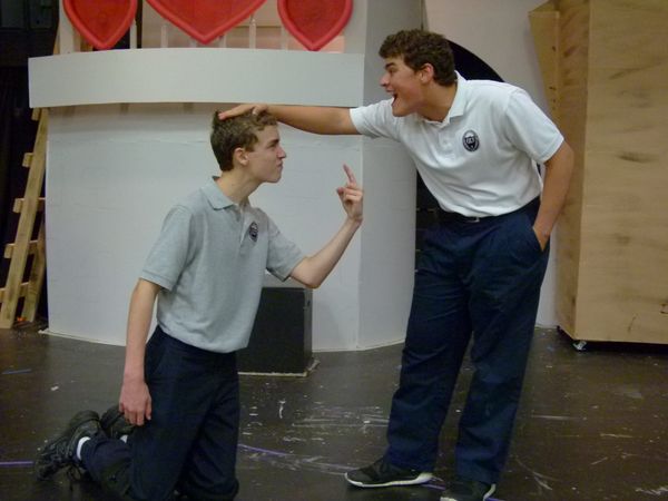 Chandler Norman (L), 7th grader "Lord Farquaad," and C J Romano (R), 8th grader "Shrek" rehearse a scene from the upcoming production of Shrek The Musical JR. 2