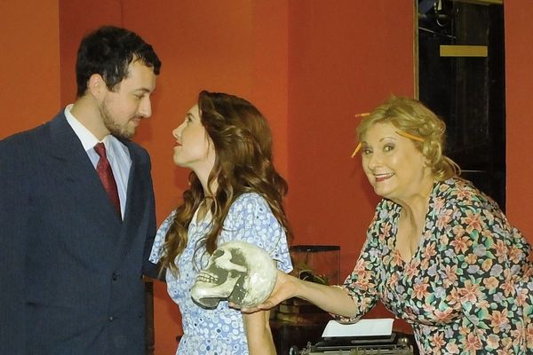 Penny Sycamore (Sue Chekaway) exchanges a loving hug to her father Grandpa Vanderhoff (Ralph Rosati) in the wacky comedy You Can’t Take It With You. 5