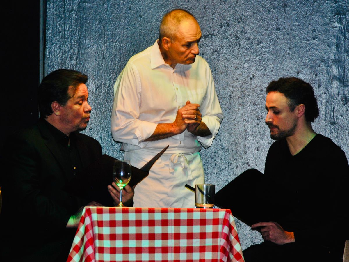 Robert (John Griffin) has lunch with best friend Jerry (Anthony Casiano), attended by waiter (Tony Verrilli) Robert (John Griffin) has lunch with best friend Jerry (Anthony Casiano), attended by waiter (Tony Verrilli)