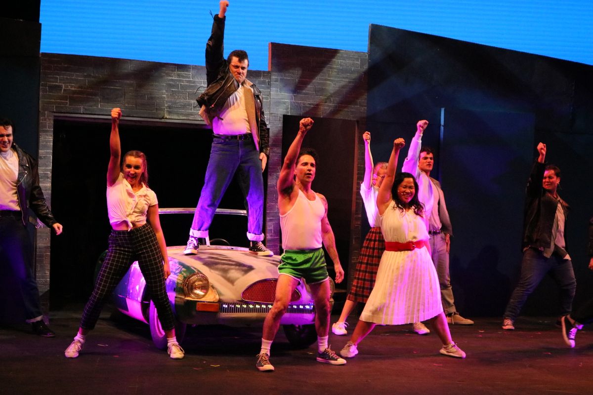 Brennan Kliztner and the cast of Grease