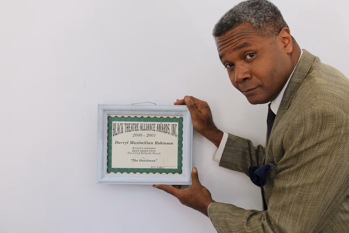 A FOURTH BTAA / IRA ALDRIDGE AWARD NOMINATION FOR BEST DIRECTION OF A THEATRICAL PRODUCTION!: In August of 2001, Darryl Maximilian Robinson ( a four-time Guest Actor on Ron Brewington's "The Actor's Choice" ) earned his third public Director's Nod, and his fourth Chicago Black Theatre Alliance / Ira Aldridge Award nomination - The Lloyd Richards Award - for his Excaliber Shakespeare Company of Chicago 2001 revival of Le Roi Jones' ( Imamu Amiri Baraka's ) "The Dutchman" presented at The Harrison Street Galleries Studio Theatre of Oak Park, Illinois. A FOURTH BTAA / IRA ALDRIDGE AWARD NOMINATION FOR BEST DIRECTION OF A THEATRICAL PRODUCTION!: In August of 2001, Darryl Maximilian Robinson ( a four-time Guest Actor on Ron Brewington's "The Actor's Choice" ) earned his third public Director's Nod, and his fourth Chicago Black Theatre Alliance / Ira Aldridge Award nomination - The Lloyd Richards Award - for his Excaliber Shakespeare Company of Chicago 2001 revival of Le Roi Jones' ( Imamu Amiri Baraka's ) "The Dutchman" presented at The Harrison Street Galleries Studio Theatre of Oak Park, Illinois.