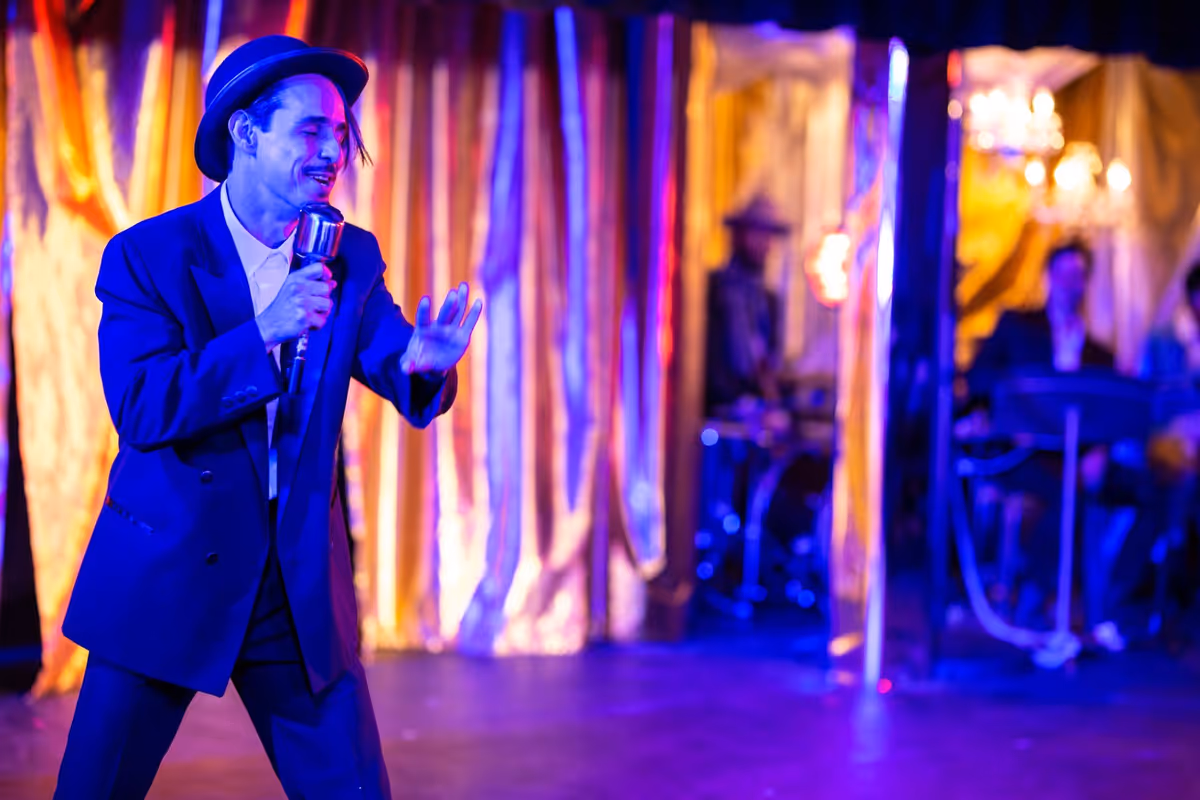 Omar Padilla as Benito Camelo in "The Bippy Bobby Boo Show" by the Danielle Georgiou Dance Group. From 2019. Photo by Jeffrey Schmidt. Omar Padilla as Benito Camelo in "The Bippy Bobby Boo Show" by the Danielle Georgiou Dance Group. From 2019. Photo by Jeffrey Schmidt.
