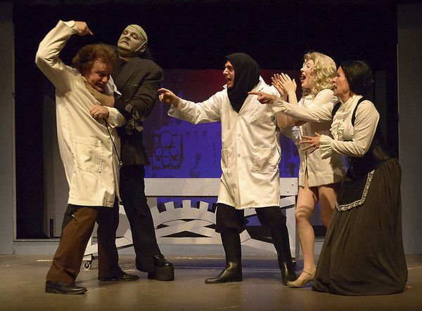 Geoff Trowbridge (Frederick Frankenstein), Jacob Medich (Monster), Jaymes Hidde-Halsey (Igor), Alexandria Sadowski (Inga) and Julie Castello (Frau Blucher) rehearse a scene from Elkhart Civic Theatre's production of "Young Frankenstein" at the Bristol Opera House. 1