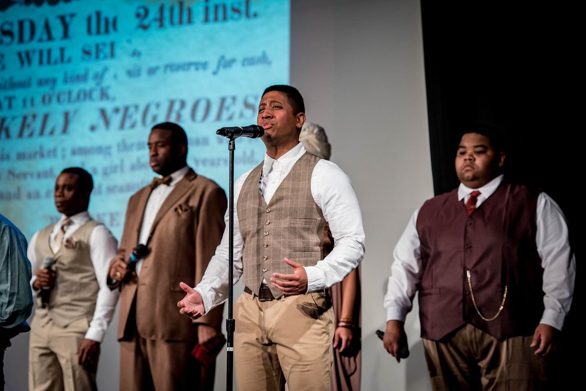 Nathan Cooney and the Ensemble sing "A Peculiar Institution" in Servant Stage Company's production of THE CIVIL WAR (Photo Credit: Sheri Niven Photography).