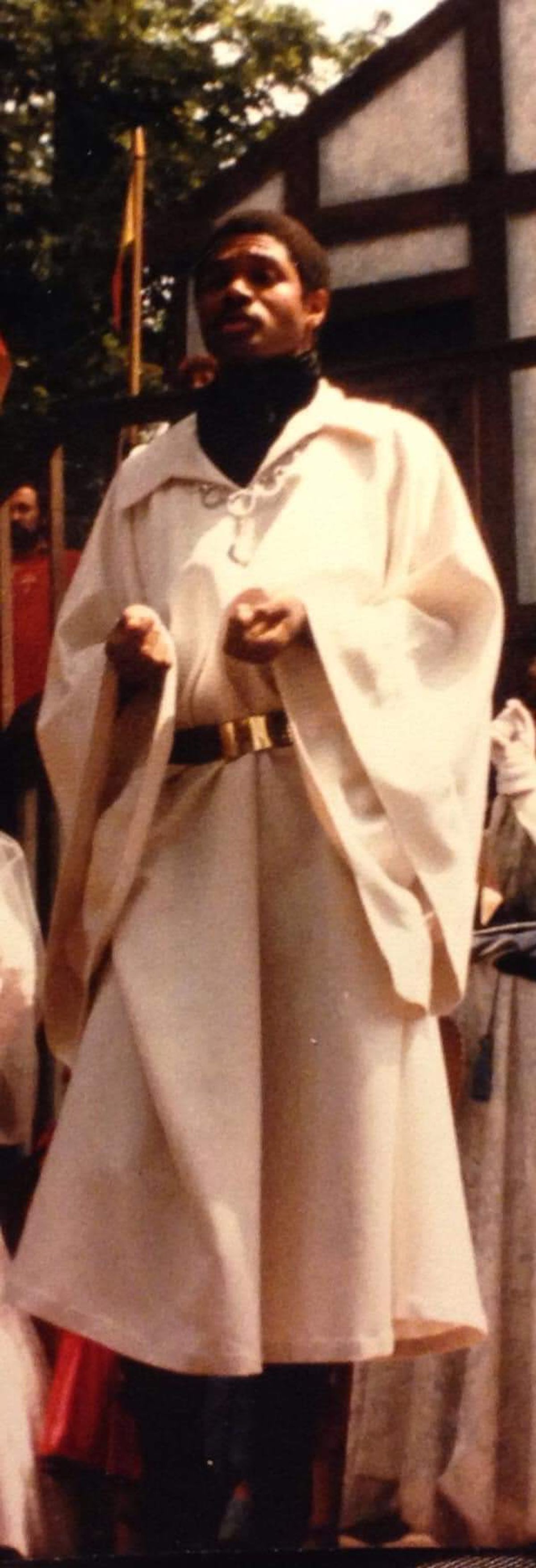 Upon the mainstage of the 1986 14th Annual King Richard's Faire of Kenosha Wisconsin, Darryl Maximilian Robinson presents himself as His Eminence, Tomas de Torquemada, The Grand Inquisitor of Spain in "Murder, They Quoth" the musical comedy mystery Grand Scenario of the faire that year.