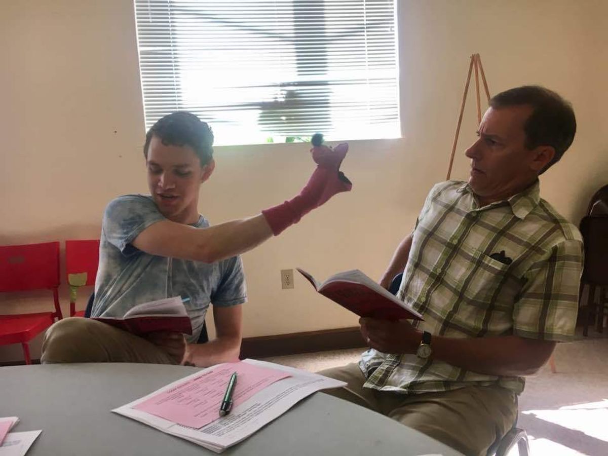 First sneak peak at rehearsal photos for Hand To God

Caleb Sohigian (Jason) with puppet Tyrone and Mark Schwann (Pastor Greg)