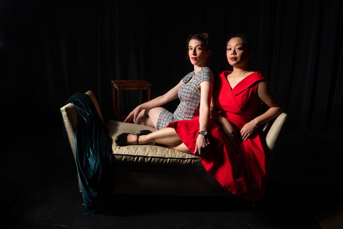 In Dial M for Murder, Maxine (Maria Marquis, left) and Margot (Gwynnevere Cristobal) have tried to stay away from each other for a year. But it doesn't look like the separation took. Photo by Christia