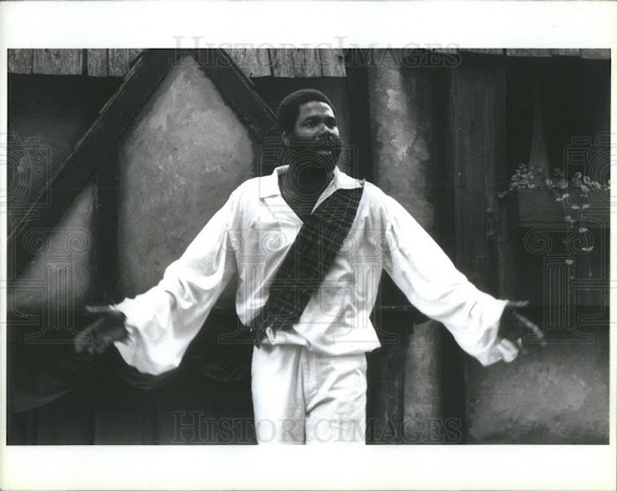 HE'S PLAYED THE MOOR!: Seen here in a 1988 performance of his critically-praised, original one-man show of Shakespeare and time-travel comedy "A Bit of the Bard" at Wisconsin's Bristol Renaissance Faire, Darryl Maximilian Robinson, who in 1984 starred in the title role of William Shakespeare's "Othello" as A Professional Guest Actor at Chicago's Northeastern Illinois University, evokes of speech of 'The Moor of Venice" from Act Three of the Bard's masterpiece: 'This fellow's of exceeding honesty...".


