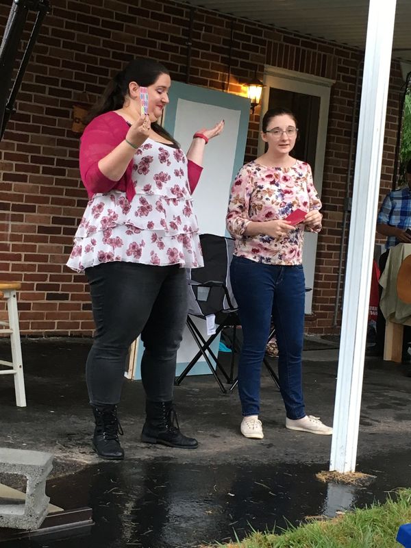 The Merry Wives of the title, Ashley White as Mistress Page on the right, Theresa Strange as Mistress Ford on the left. 1