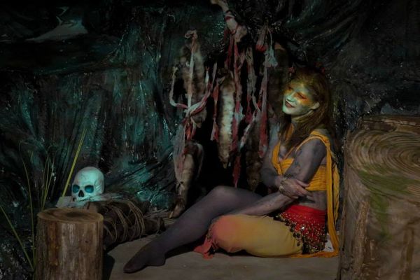 Stephano (Scott Hoffman) feeds Caliban (Tony Palmieri) his celestial liquor. 2