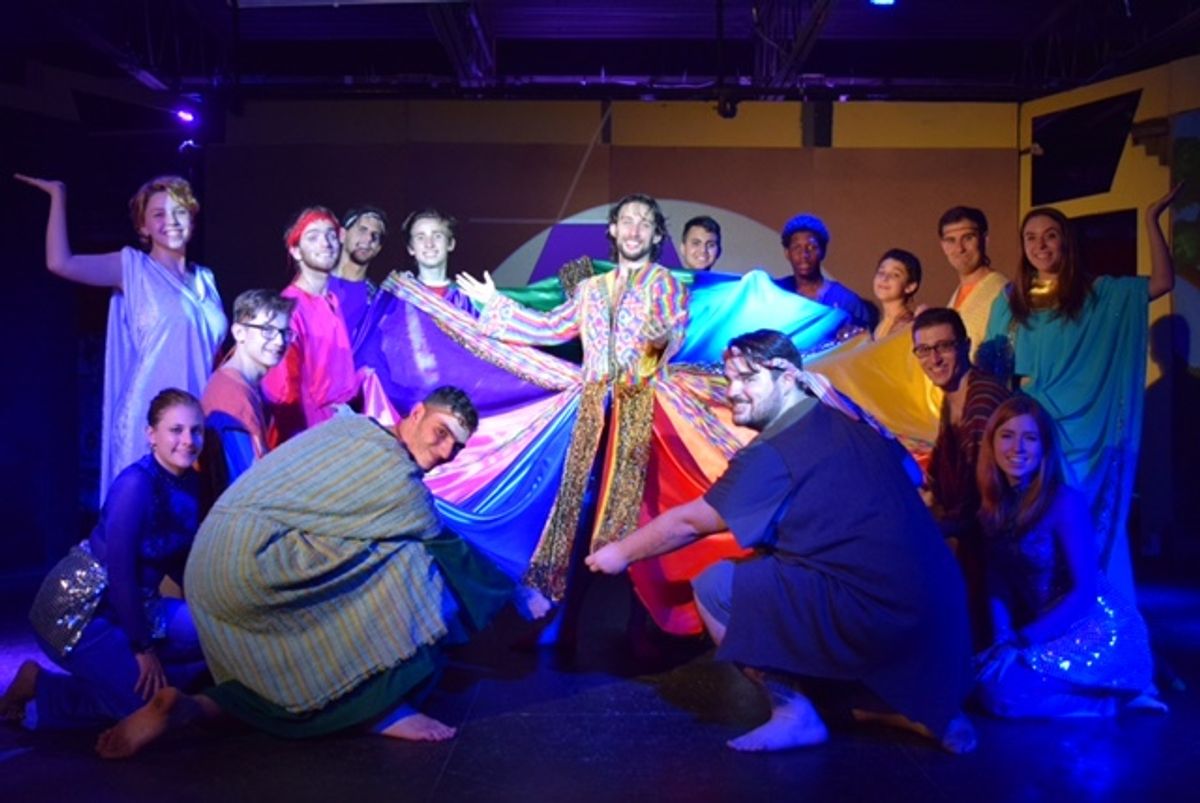 Joseph with his amazing technicolor coat and the supporting cast. Joseph with his amazing technicolor coat and the supporting cast.