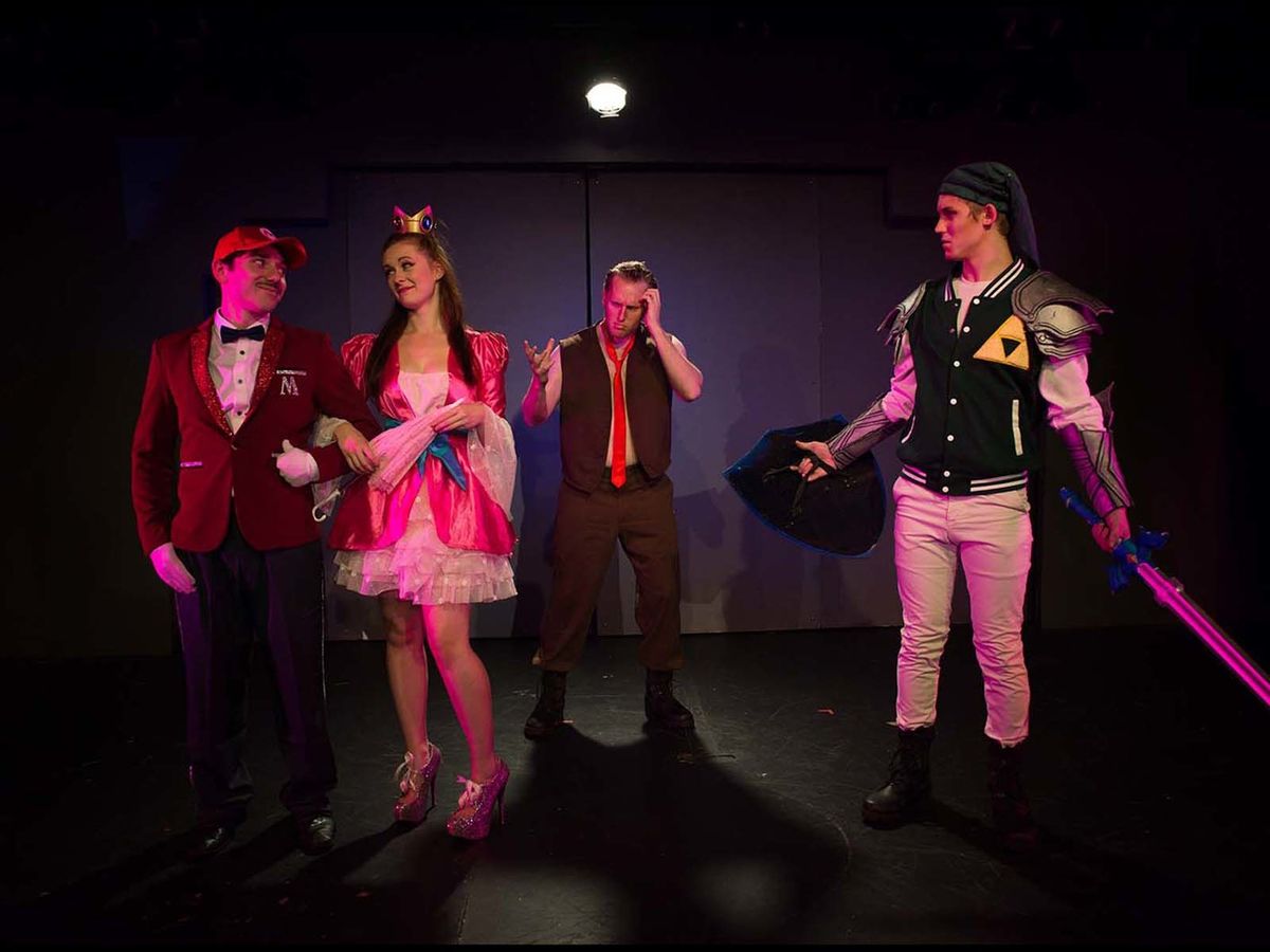 Mario (Dan Anderson), Princess Peach (Dana Eckley) with on lookers Donkey Kong (Brandon Schraml) and Link (Matthew Peters). 