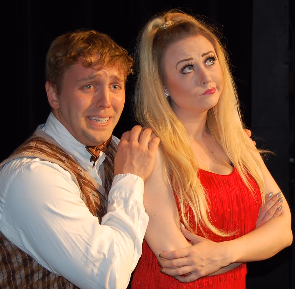 Charity (Lori Smith) contemplates if Oscar (Zak Shugart) is the guy for her in the musical Sweet Charity Charity (Lori Smith) contemplates if Oscar (Zak Shugart) is the guy for her in the musical Sweet Charity
