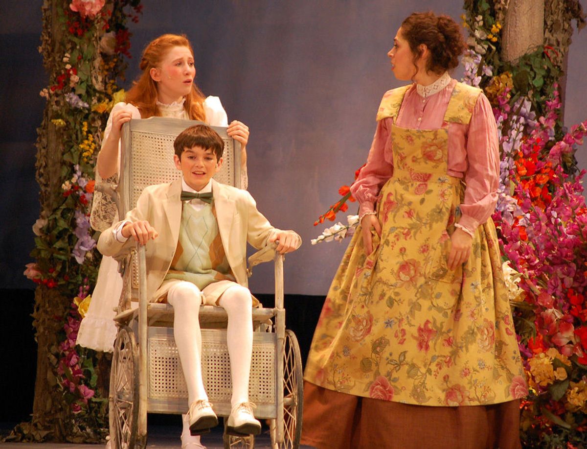Child actor Will Higgins (Colin Craven) and Northwestern students Carly Robinson (Mary Lennox) and Aldi Aldaheff (Martha) in The Secret Garden, running at the Theatre and Interpretation Center at Northwestern University, running through November 21.  Photo by Spencer Neiman.
 