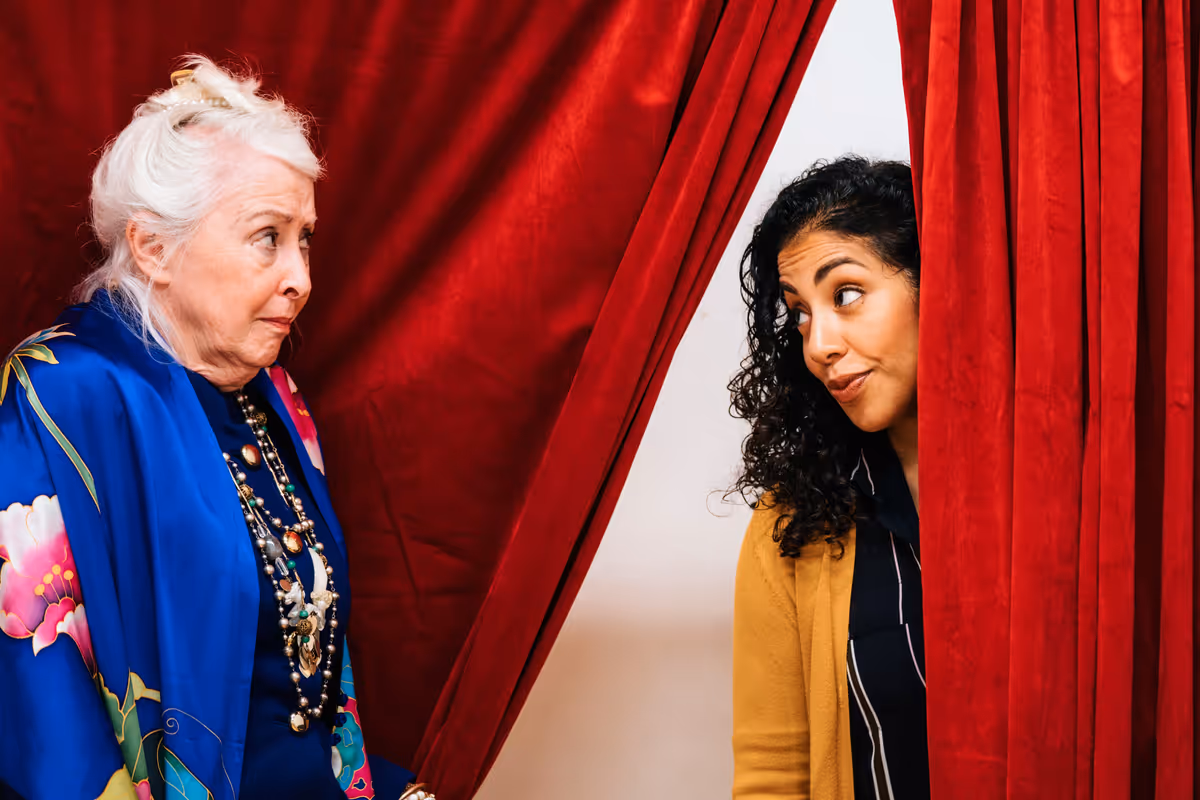 Denise Tyrrell (Dolores) and Regina Morones (Maya) star in Jonathan Spector''s new play ''Best Available'' at Shotgun Players in May and June 2024. Photo by Robbie Sweeny. Denise Tyrrell (Dolores) and Regina Morones (Maya) star in Jonathan Spector''s new play ''Best Available'' at Shotgun Players in May and June 2024. Photo by Robbie Sweeny.