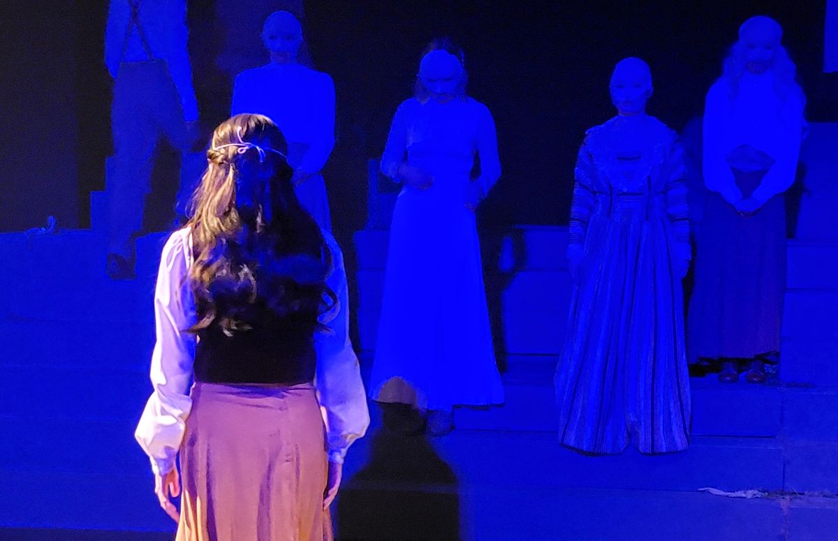 The chorus helps to tell the stories of Spoon River.