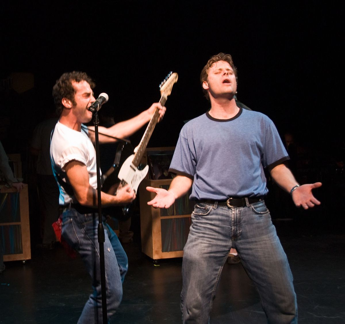 Todd Micali as Bruce Springsteen and Jeffrey M. Wright as Rob Gordon, in New Line Theatre's 2008 production of HIGH FIDELITY. Both actors return for the 2012 production. Photo credit: Michael C. Daft. Todd Micali as Bruce Springsteen and Jeffrey M. Wright as Rob Gordon, in New Line Theatre's 2008 production of HIGH FIDELITY. Both actors return for the 2012 production. Photo credit: Michael C. Daft.