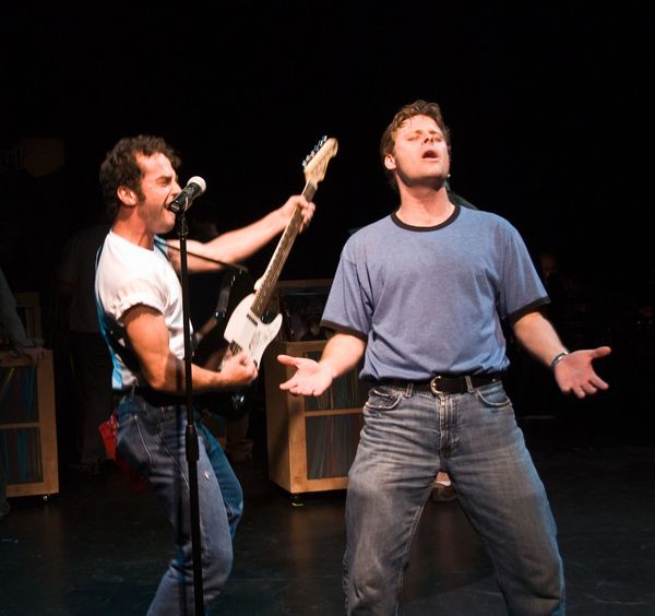 Todd Micali as Bruce Springsteen and Jeffrey M. Wright as Rob Gordon, in New Line Theatre's 2008 production of HIGH FIDELITY. Both actors return for the 2012 production. Photo credit: Michael C. Daft. 2