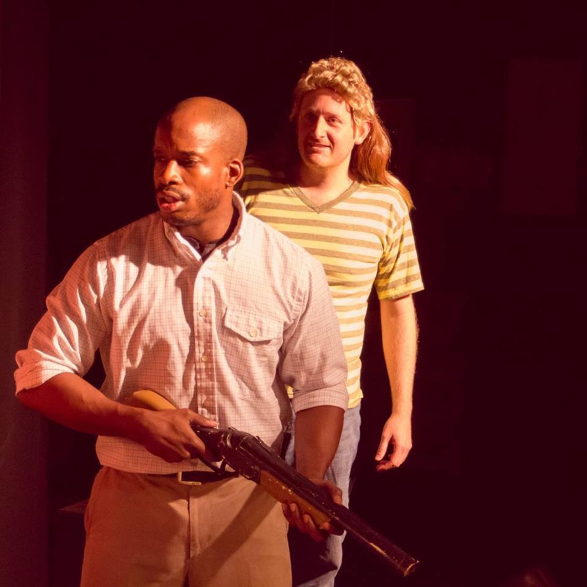 Ben (Sedric Willis) protects Ted (Shaun Yates) and the gang of fellow survivors in Musical of the Living Dead. Ben (Sedric Willis) protects Ted (Shaun Yates) and the gang of fellow survivors in Musical of the Living Dead.