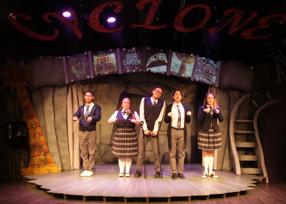Jared Machado as Mischa Bachinski, Rose Prell as Constance Blackwood, Jaylen Baham as Ricky Potts, Wyatt Hatfield as Noel Gruber, and Haley Wolff as Ocean O'Connell Rosenberg in Chance Theater's California premiere production of "Ride the Cyclone." Playing January 27 - February 26, 2023 at Bette Aitken theater arts Center on the Cripe Stage. Music, Book, and Lyrics by Jacob Richmond & Brooke Maxwell; Directed by Jocelyn A. Brown; Music Direction by Lex Leigh; Choreographed by Miguel Cardenas. Photo by Doug Catiller, True Image studio Jared Machado as Mischa Bachinski, Rose Prell as Constance Blackwood, Jaylen Baham as Ricky Potts, Wyatt Hatfield as Noel Gruber, and Haley Wolff as Ocean O'Connell Rosenberg in Chance Theater's California premiere production of "Ride the Cyclone." Playing January 27 - February 26, 2023 at Bette Aitken theater arts Center on the Cripe Stage. Music, Book, and Lyrics by Jacob Richmond & Brooke Maxwell; Directed by Jocelyn A. Brown; Music Direction by Lex Leigh; Choreographed by Miguel Cardenas. Photo by Doug Catiller, True Image studio