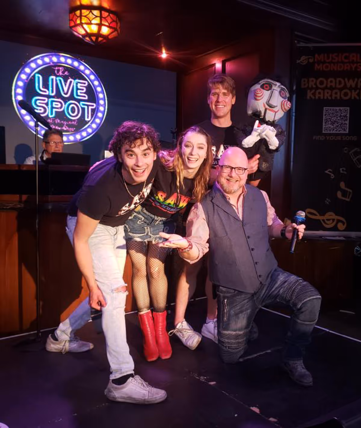 Jack Cathcart (AdaM), Alyssa Corella (Jigsaw/Amanda), and Riley Nottingham (Dr. Gordon) perform at Musical Mondays at the Abbey in West Hollywood