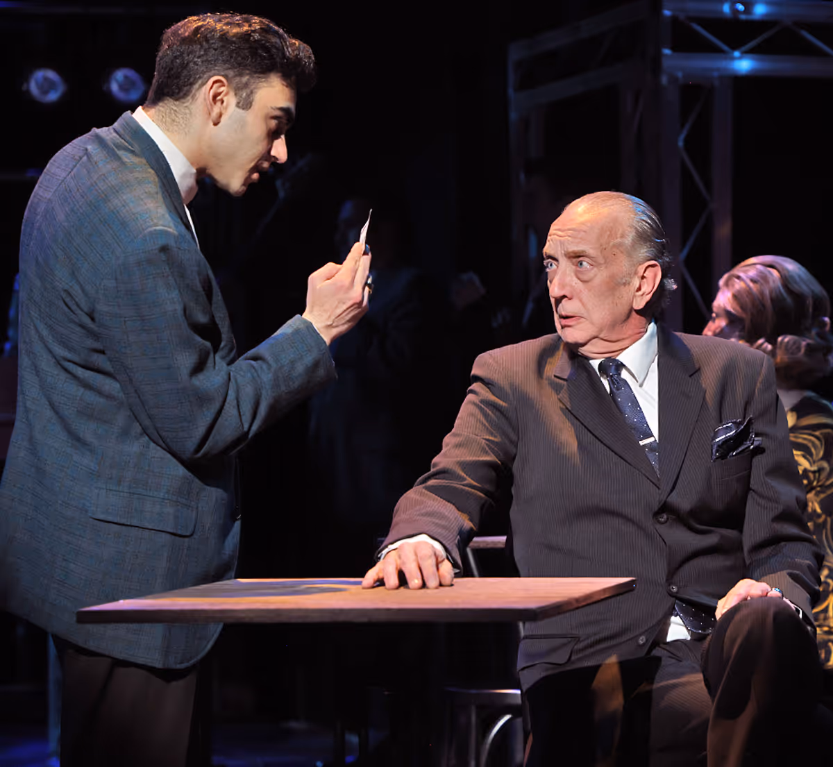 Frankie Valli (Gian Raffaele DiCostanzo), left, calls in a favor from Gyp DeCarlo (Jeff Stockberger) in Beef & Boards Dinner Theatre''s production Jersey Boys, now on stage through April 13. Frankie Valli (Gian Raffaele DiCostanzo), left, calls in a favor from Gyp DeCarlo (Jeff Stockberger) in Beef & Boards Dinner Theatre''s production Jersey Boys, now on stage through April 13.