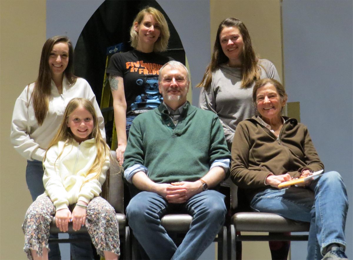 Seated L-R: Natalie Nyberg, Clark S Phinney and Lisa Copenhaver. Standing L-R Ashley Nyberg, Suzanne Martin Dorian and Alicia Belmore. Missing cast members: Kathleen Reynolds Brainerd and Bella Coulom