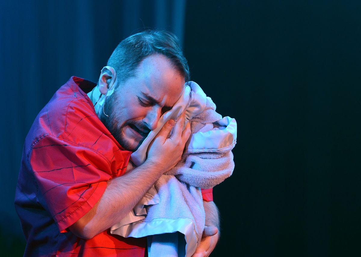 Nathan Crooks as Linus with his blanket. Nathan Crooks as Linus with his blanket.