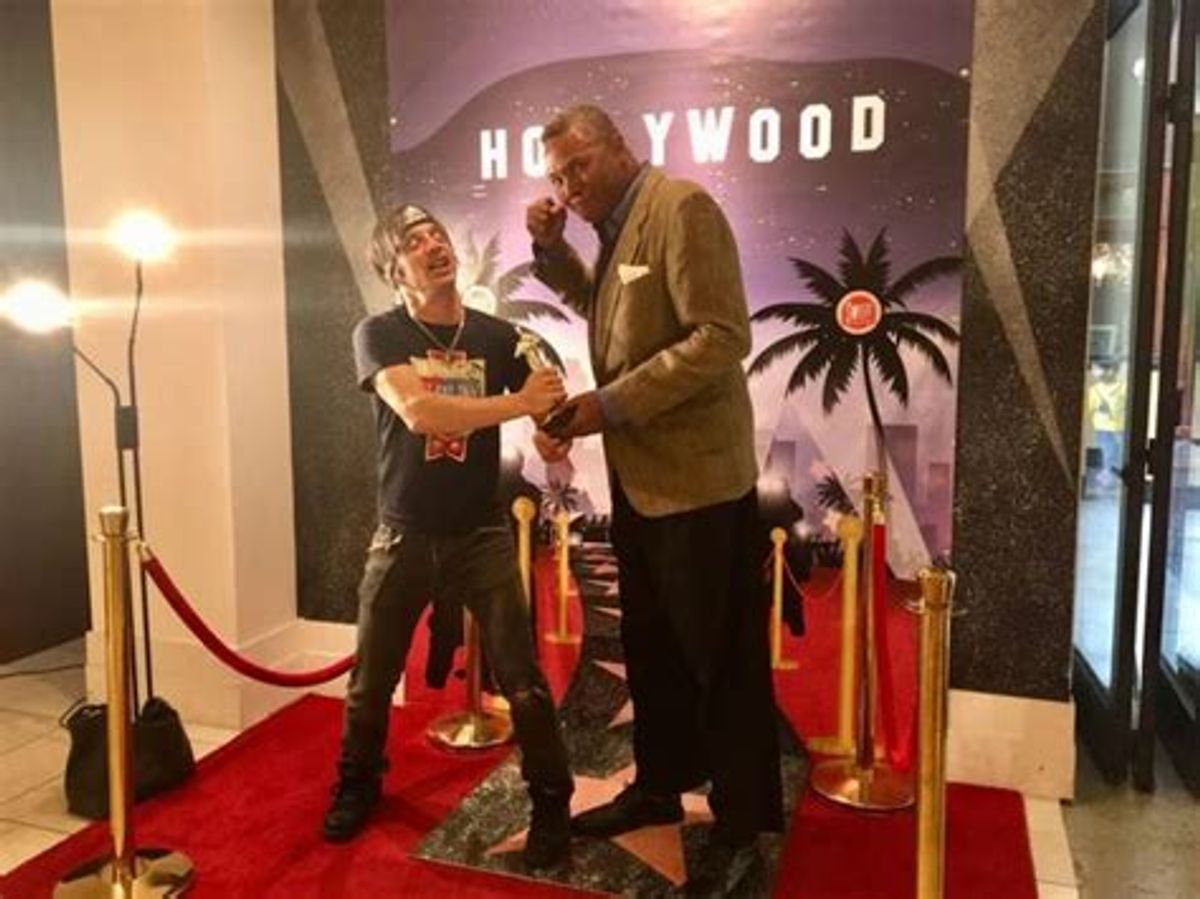 Chicago Stage Actors Can Tussle: Again For Laughs during a 2017 visit to Sweet! In Hollywood, veteran theatre performers Danny Belrose and Darryl Maximilian Robinson have a dispute over Fake Oscars.