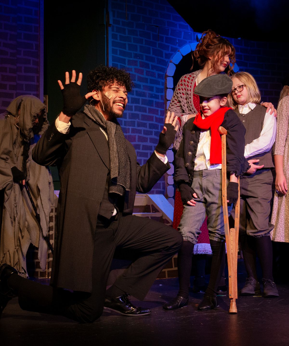 L TO R: Christian No l as Bob Cratchitt, Abby C. as Tiny Tim  