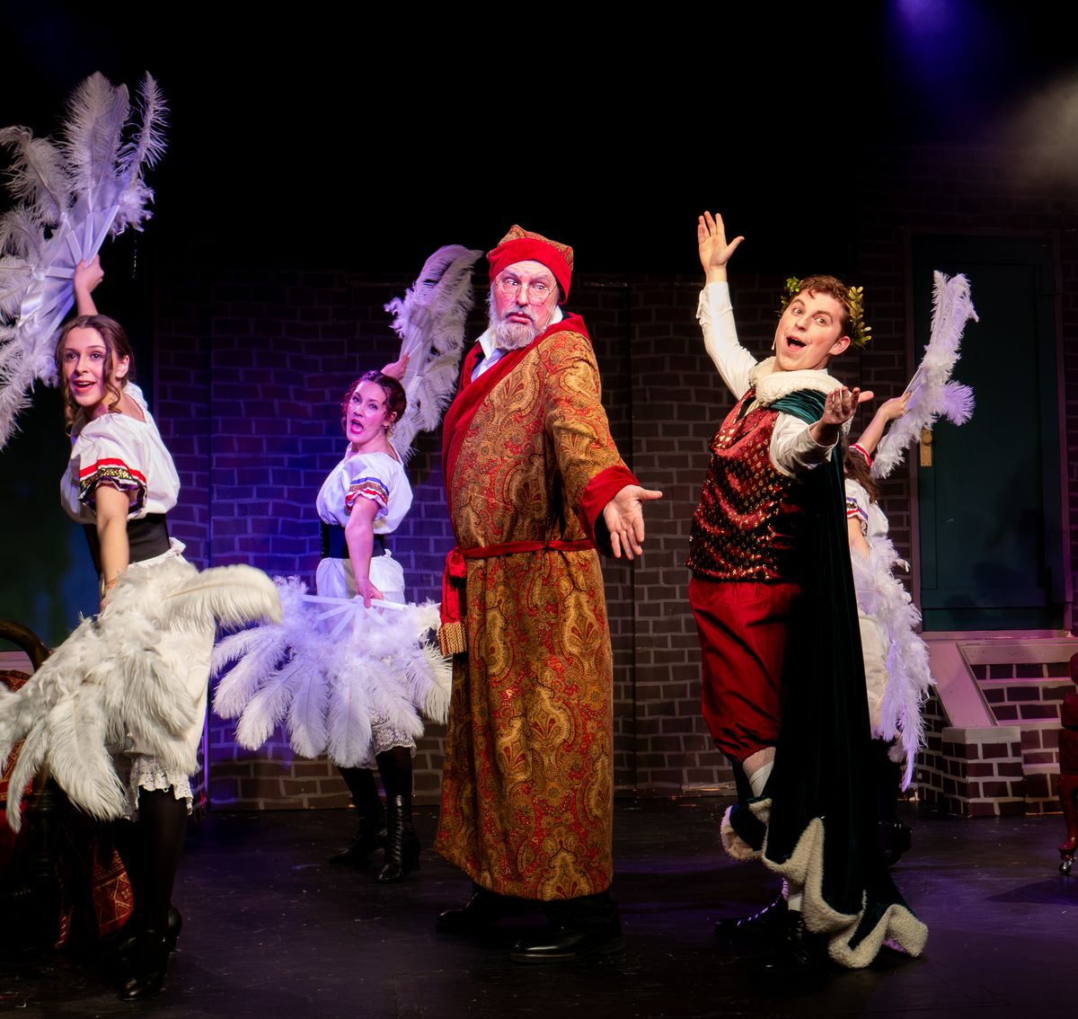 L TO R:  Claire Z as Ensemble, Kate Phillip as Ensemble, Darrell Meek as Scrooge, Justin Roth as Present