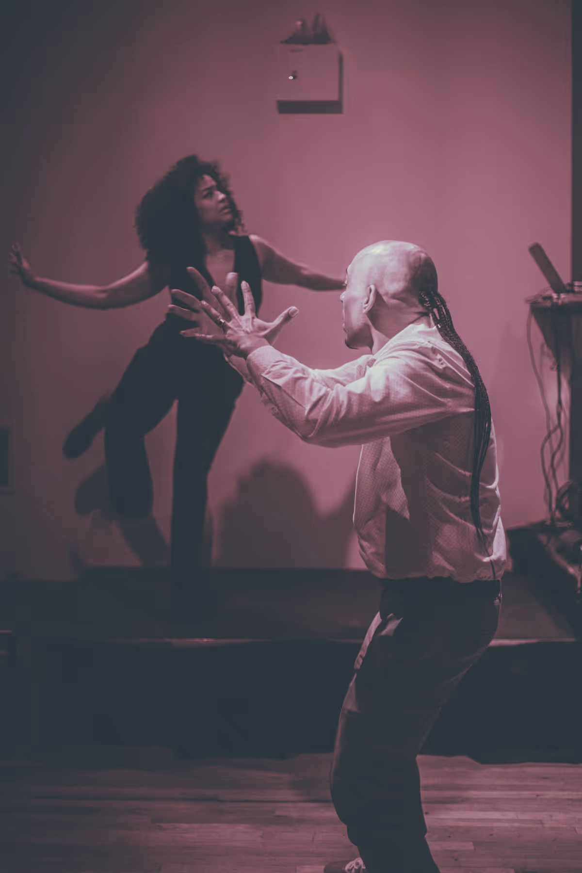 ASL Artist and CODA, Alberto Medero, performs his poetry with dancer and choreographer, Mary-Angela Granberry at the 7:30pm show