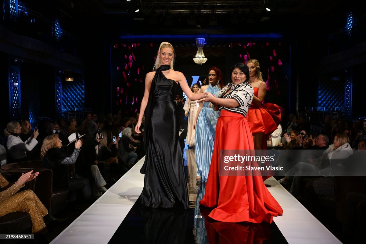 HiTechMODA Productions NYFW Season 13 - Yesi Rose Fashion NEW YORK, NEW YORK - FEBRUARY 08: Violinist Dr. Edward W. Hardy performs on stage while models walk the runway wearing Yesi Rose Fashion duri HiTechMODA Productions NYFW Season 13 - Yesi Rose Fashion NEW YORK, NEW YORK - FEBRUARY 08: Violinist Dr. Edward W. Hardy performs on stage while models walk the runway wearing Yesi Rose Fashion duri