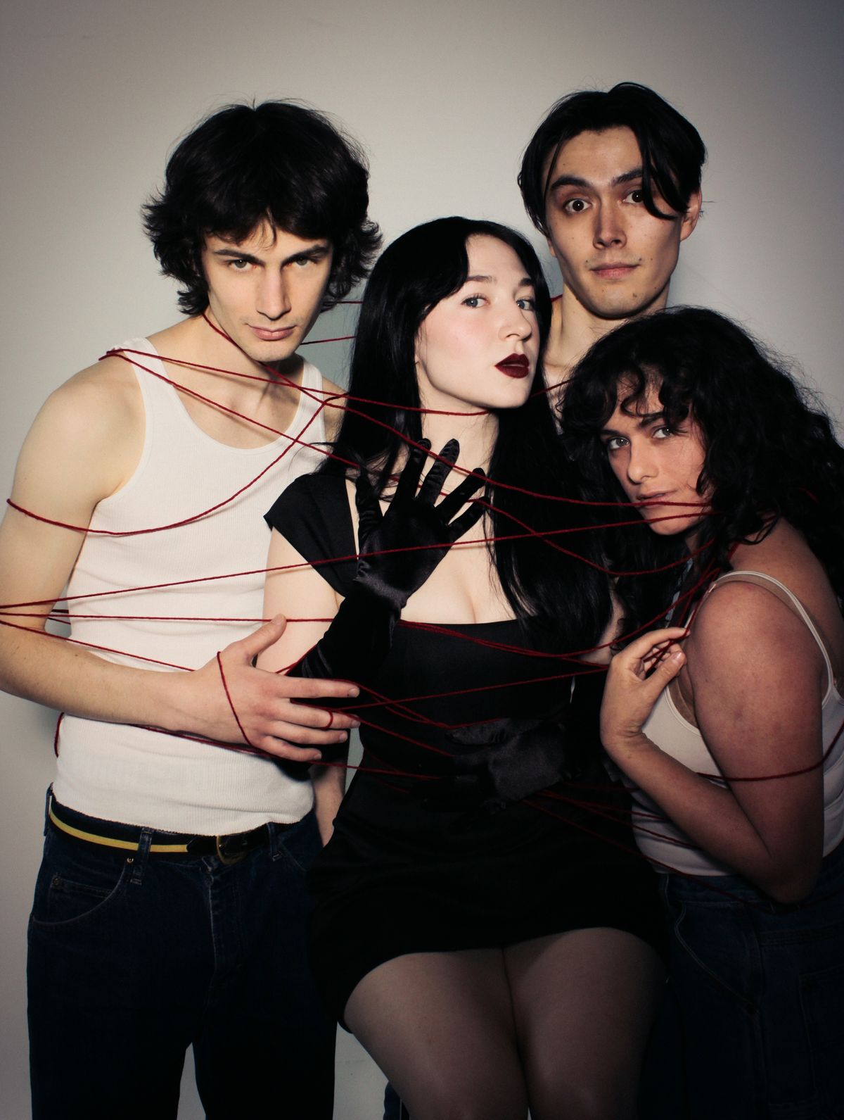 Lucy, played by Sophia Madeline Morrison, and her lovers, played by Sebastian Kim, Jack Colton Clark, and Rachel Mu  oz.