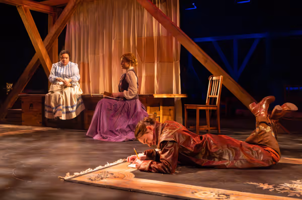 Beth, Meg, and Jo in their attic (l-r: Amy Rene Byrne, Kimie Muroya, and Mackenzie Moyer). Photo by Kyle Huggins.  3