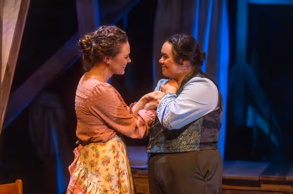 Amy March (Arrianna Daniels) reunites with Laurie (Kimie Muroya). Photo by Kyle Huggins.  15