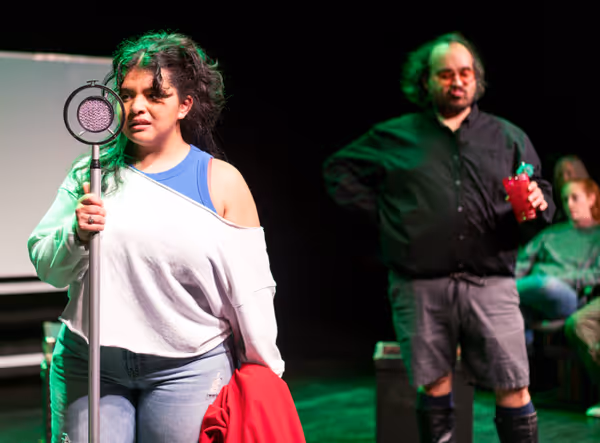 Anette Orellana as Liliana Tzintz  n and Henry Ballesteros as Fernando Calder  n in Spit in Your Face by Paul Heller and Alberto Lomnitz  Credit: Christine Bedenis, Detroit Repertory Theatre 6
