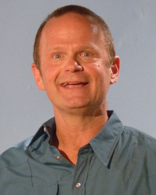 Angus awaits his bread to complete baking. 4