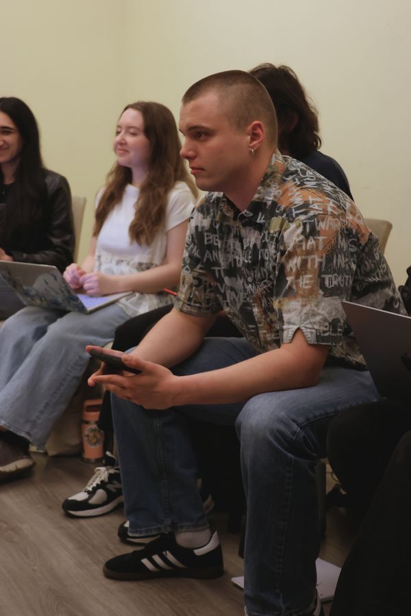 Connor Spaulding (Playwright) watches actors Diego Tobar (Carson) and Matt Hekking (Maxwell) act out a scene from the reading. 5