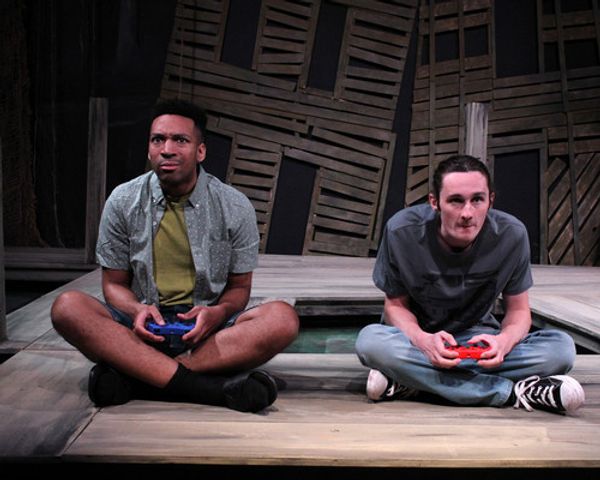 Ezekiel Mitchell VI (Stefon Funderburke) and Apparition (Jesse Boyd-Williams) in Williamston Theatre's production of 