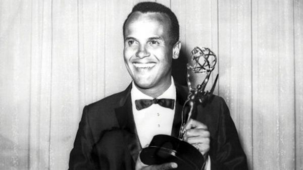 AMERICA'S FIRST AFRICAN-AMERICAN MALE PERFORMER TO WIN THE EMMY!: Here is the legendary star Harry Belafonte with his 1960 Emmy Award as Outstanding Performer for his 1959 television music special 