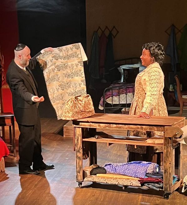 Esther (Nakeisha McGee) is stitching away on INTIMATE APPAREL for a client in the opener for Season 42 at Carpenter Square. 4