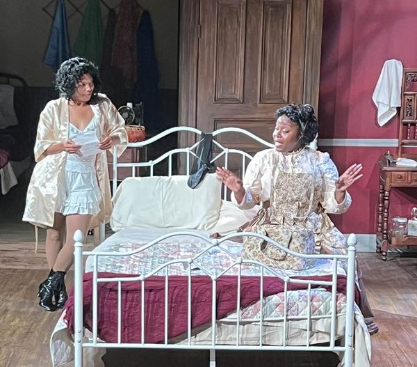 Esther (Nakeisha McGee) is stitching away on INTIMATE APPAREL for a client in the opener for Season 42 at Carpenter Square. 7